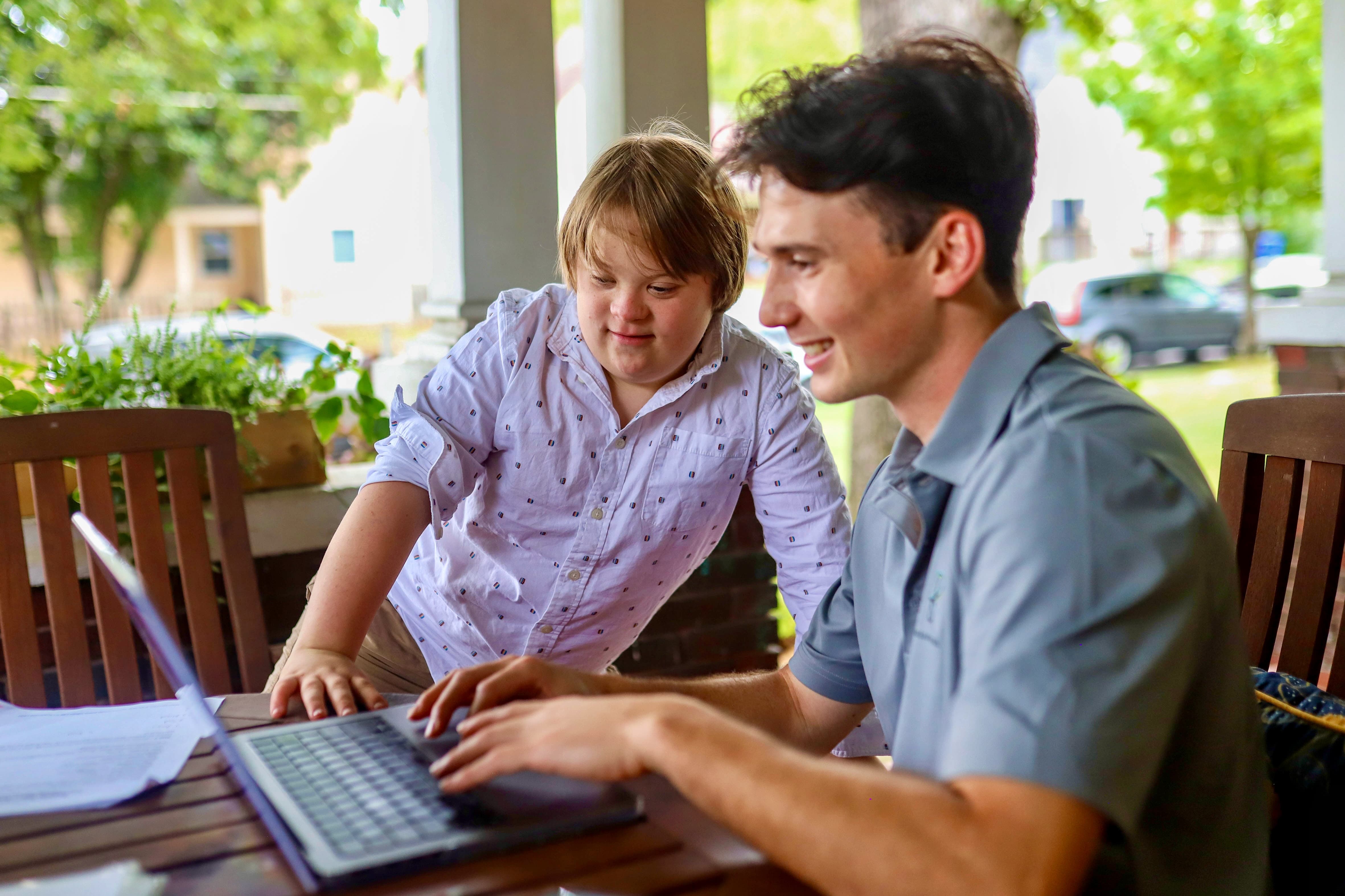 Noah Perales with a younger client